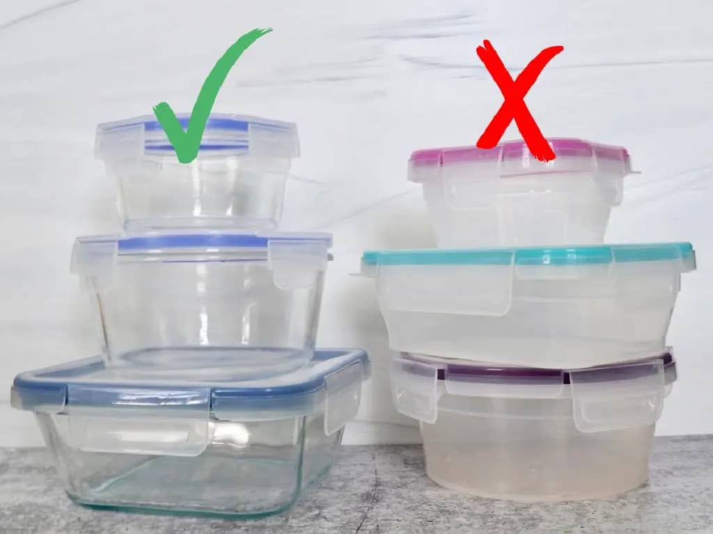 three stacked glass food containers next to three stacked plastic food containers